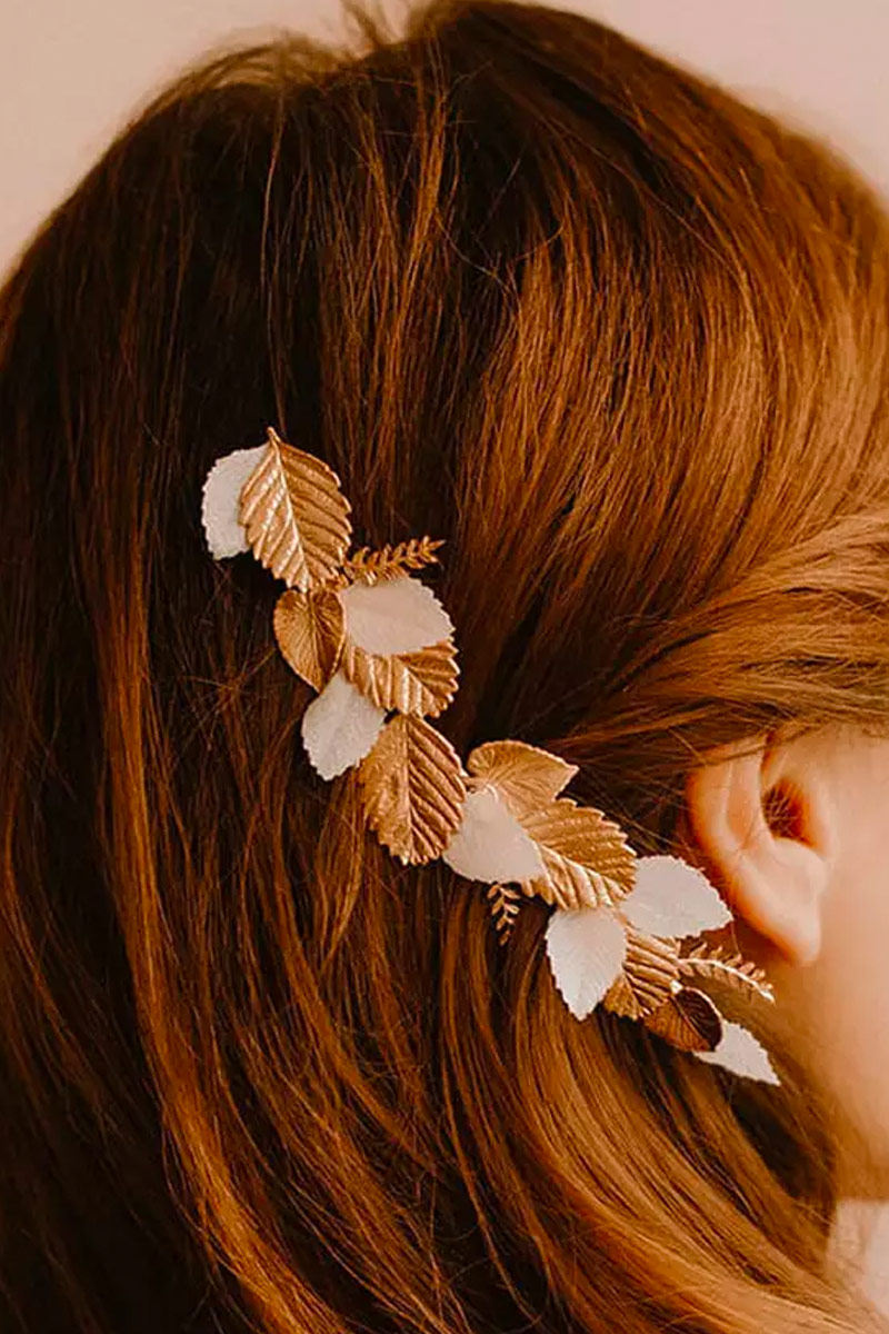 Peigne de cheveux doré et blanc